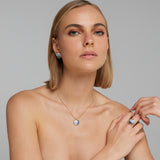 Collana disco piccolo in argento dorato con zirconi bianchi azzurri e blu
