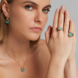 Orecchini in argento dorato con quarzo neon blu