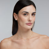 Collana con ciondolo tondo in argento dorato con zirconi bianchi